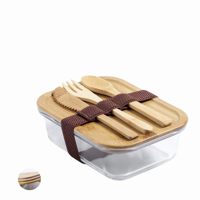A glass lunch box with a bamboo lid and utensils, secured with a brown strap. Features a modern design.