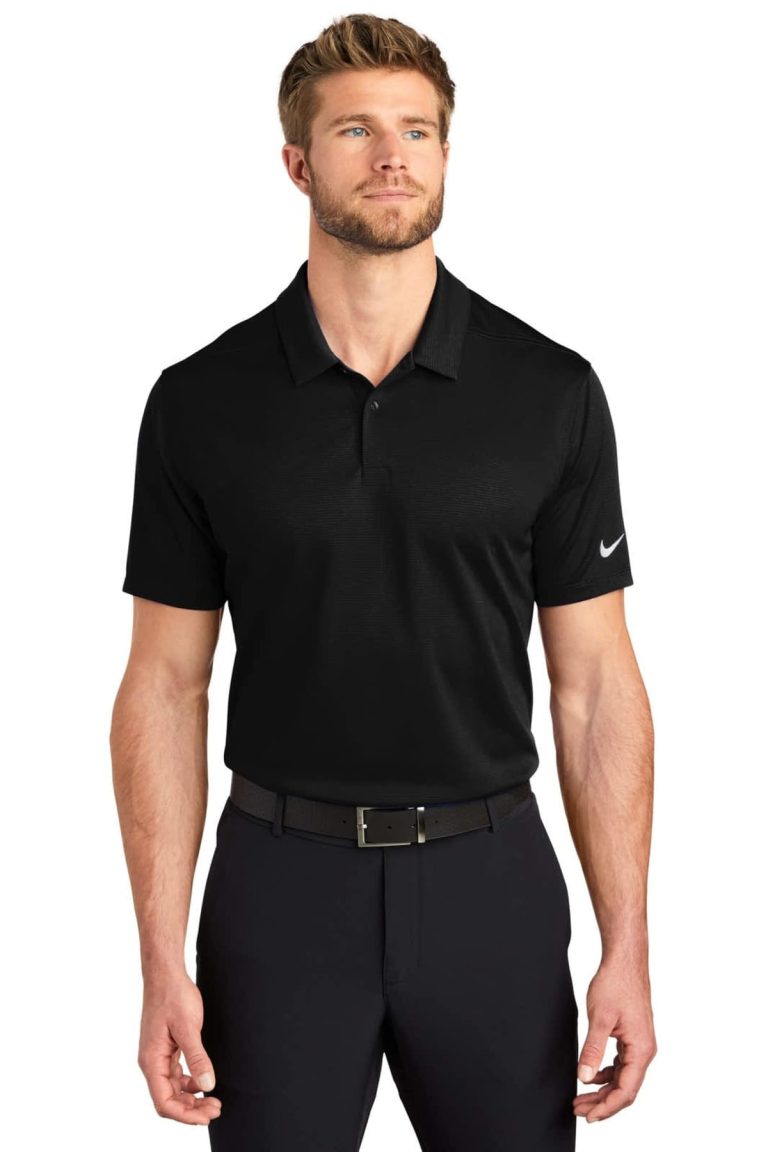 A black Nike polo shirt with short sleeves and a collar, featuring a logo on the sleeve.